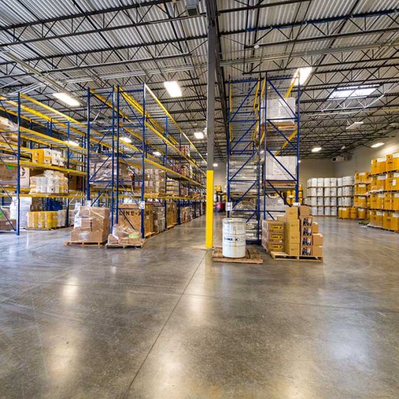 LINE-X warehouse storing polyurea chemical supplies