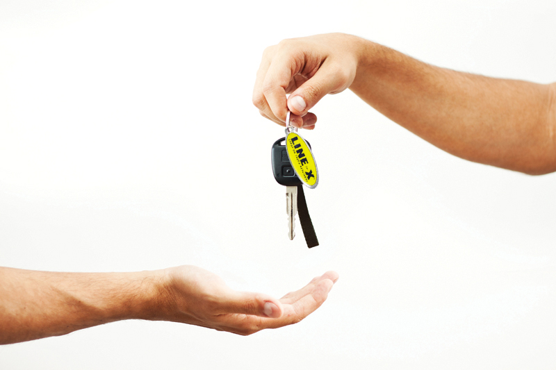 Handing over vehicle keys after a fast LINE-X return to service
